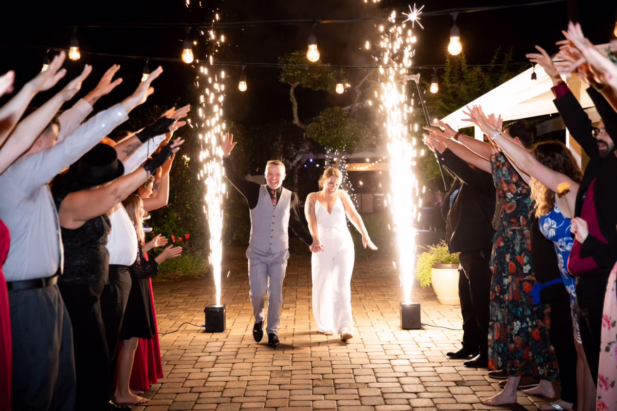 sparkler exit wedding celebration orlando celebration gardens winter park - Weddings Bride and groom running through sparkler tunnel exit with wedding guests at Orlando Celebration Gardens in Winter Park Florida during nighttime reception celebration
